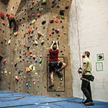 Students rock climbing at Stout Adventures
