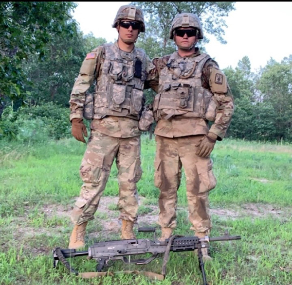 Kjellberg, pictured with his sergeant, is deploying with the 829th Engineer Company based in Spooner.