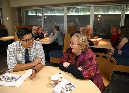 UW-Stout student Anthony Diaz, of Baraboo, talks with donor Linda Arzoumanian after receiving the Arzoumanian/Drake Endowed Scholarship during a scholarship program Sept. 14 on campus. Diaz is majoring in packaging.