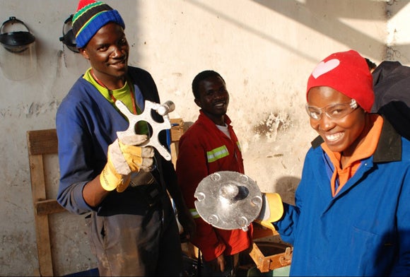 Residents of Mzuzu, Malawi, work on a hydroelectric generator project in collaboration with UW-Stout.