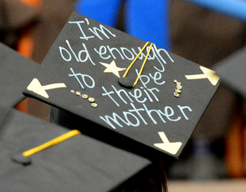 Joanie Dulin of Menomonie had some fun with her age on her mortarboard.