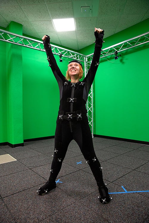 Danielle Pedersen, an entertainment design major, is surrounded by cameras as she acts in UW-Stout’s motion capture studio.