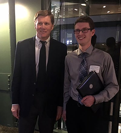 UW-Stout student Austin Wheaton, right, meets with Green Packers CEO Mark Murphy at Lambeau Field after winning the Internship Draft Day top scholarship.