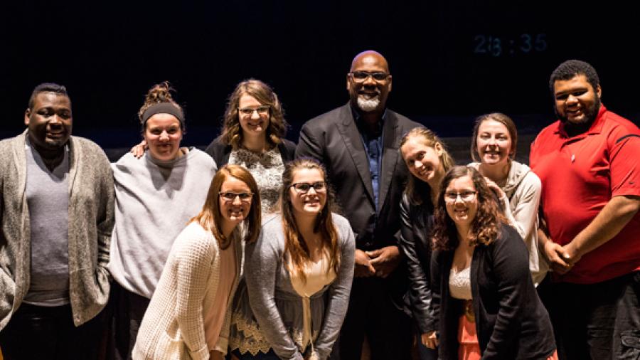 Students in ASPIRE-Student Support Services programs gather with Rob Davis, back row fourth from left, a Green Bay Packers staff member and former player. The students, who graduate May 6, are front row from left, Mary Kate Mahmood, vocational rehabilitation; Skylar Kitchner, human development and family studies; and Rebecca Marquard, family and consumer sciences education. Back row, Javante Watson-Hall, HDFS; Laura Manley, HDFS; Corrine Prince, early childhood education; Amber Cummings, HDFS; Rachel Rowles
