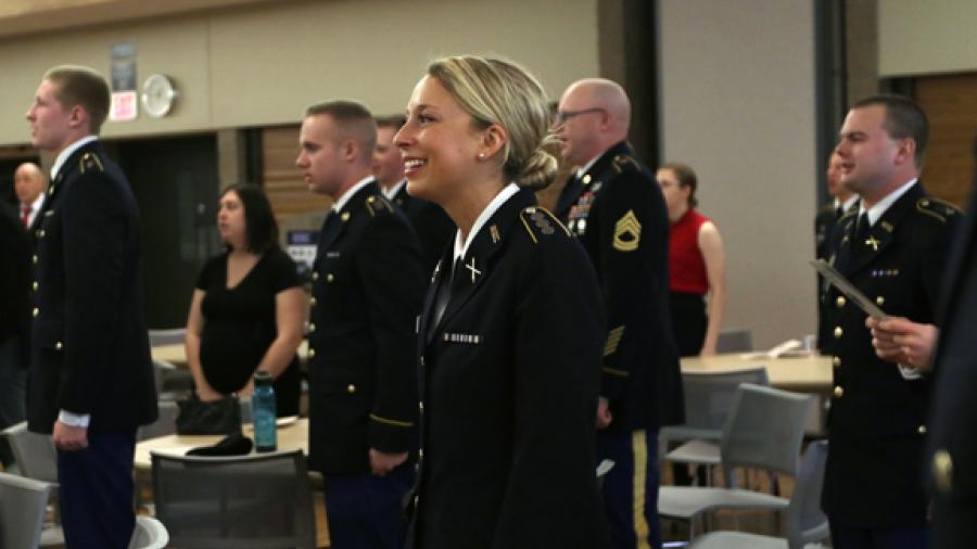 Cadets stand at attention during a 2015 Army ROTC Northwoods Battalion commissioning ceremony at UW-Stout.
