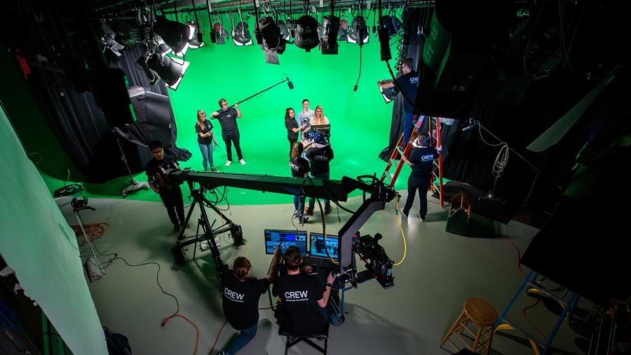 Video production students in the Green Screen lab.