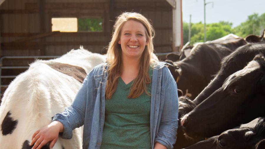 Christine Leonard with her families’ dairy cows. 