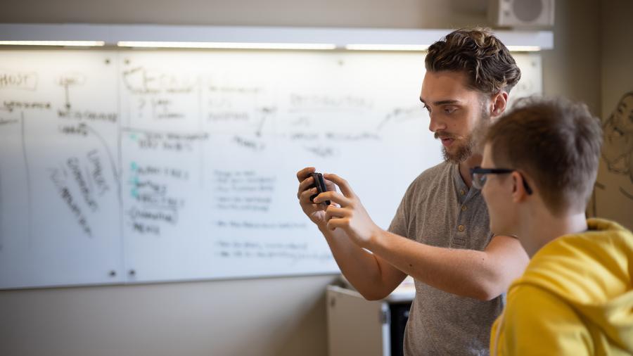 Students Harrison Kelly, at left, and Brian Bauch test the SMARTArt app.