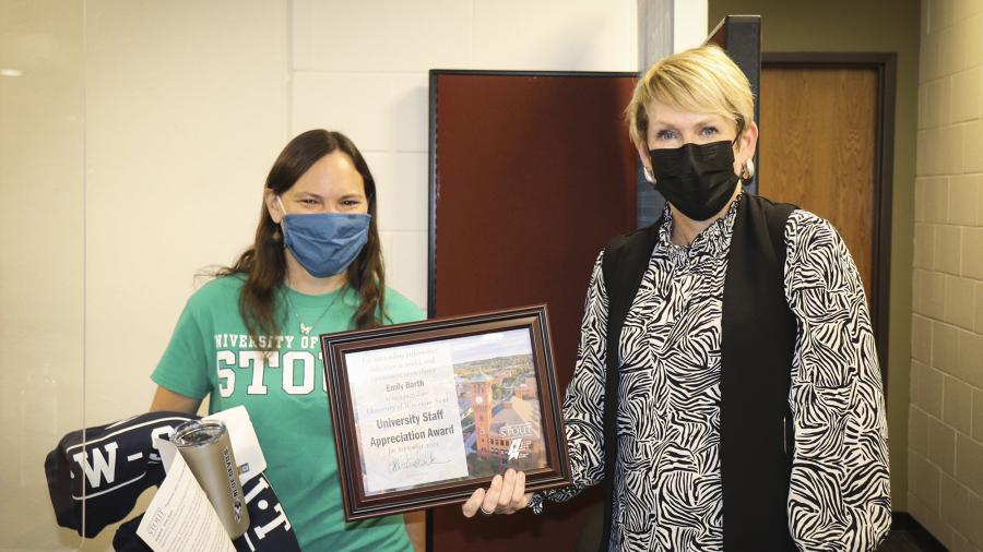Emily Barth, at left, with Chancellor Katherine Frank receiving the September University Staff Appreciation Award.