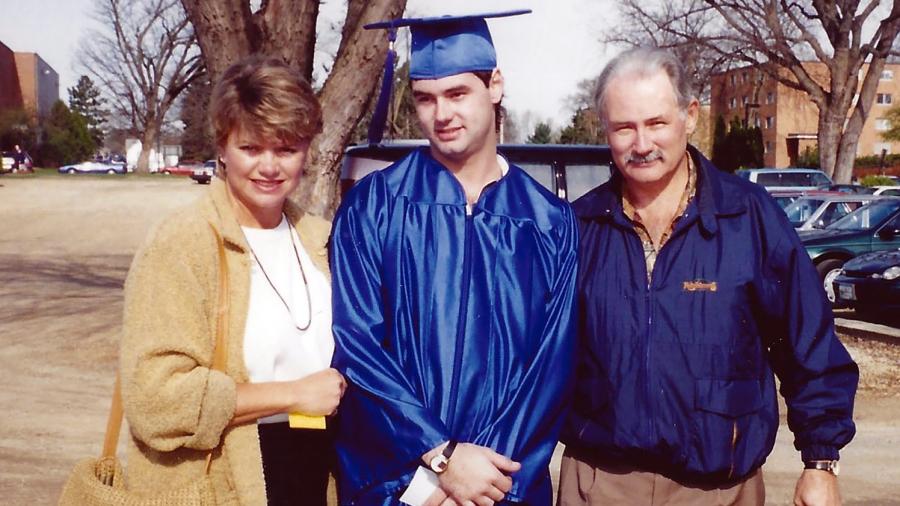 Jed Copham with his parents, Cheryl and Dave, on graduation day at UW-Stout in 1997.