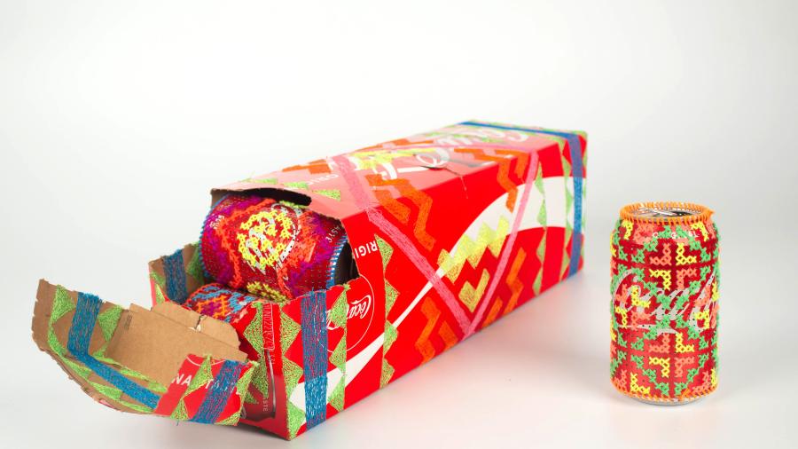 Soda box and can with decorative and colorful stitching on them