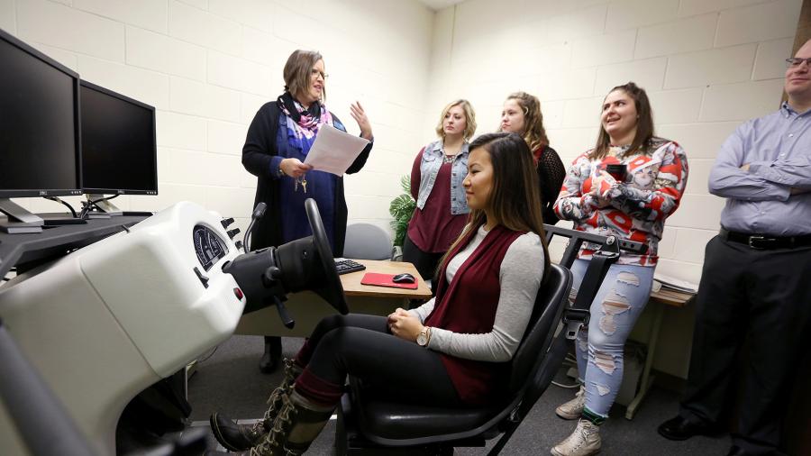 Rehabilitation counseling graduate students in Professor Daniel Kelsey's Professional Orientation course learn about assistive technology and independent living during a visit to the Stout Vocational Rehabilitation Institute. 