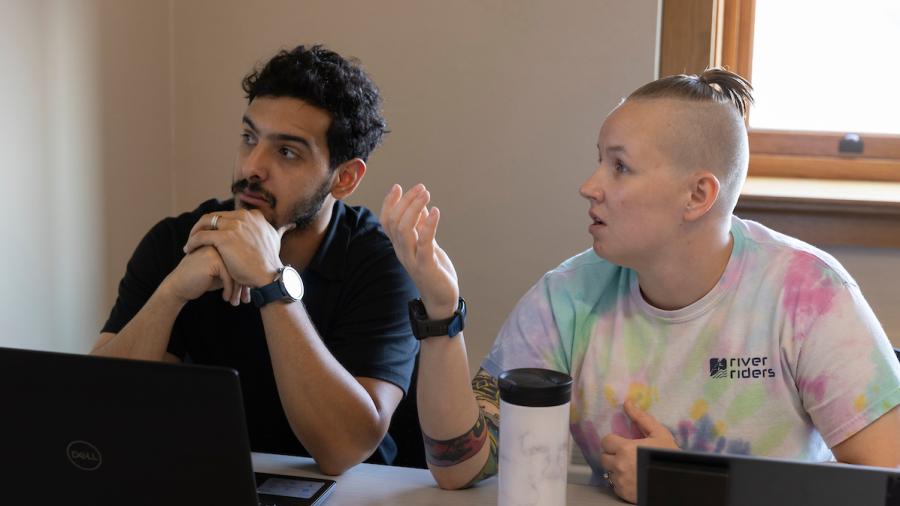 Applied psychology students reviewing data