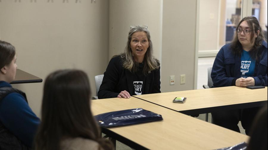 Ann Carlisle, director of UW-Stout’s art education undergraduate program, speaks to high school students during Teach Day.