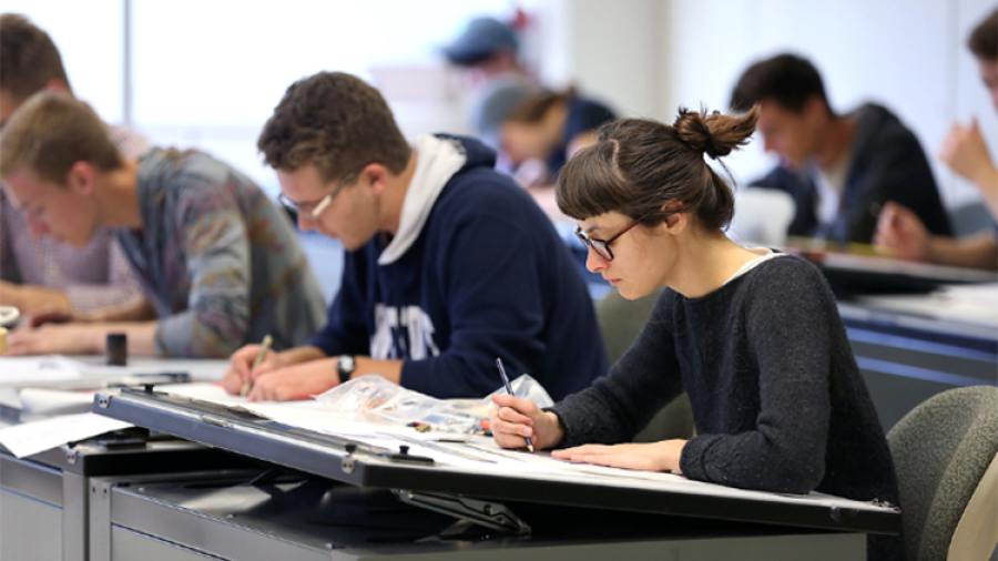 Students work on a gesture drawing project in a design class at UW-Stout.