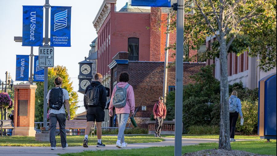 Students walk to class near Harvey Hall during the first week of the 2024 fall semester at UW-Stout.