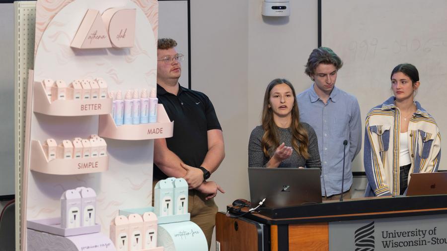 Students present their Athena Club product display solutions to Great Northern Corp. and Athena Club representatives on campus.