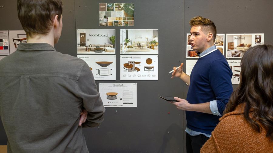 A student discusses his furniture concepts.
