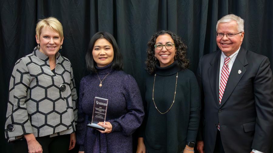 Min DeGruson with her UW award