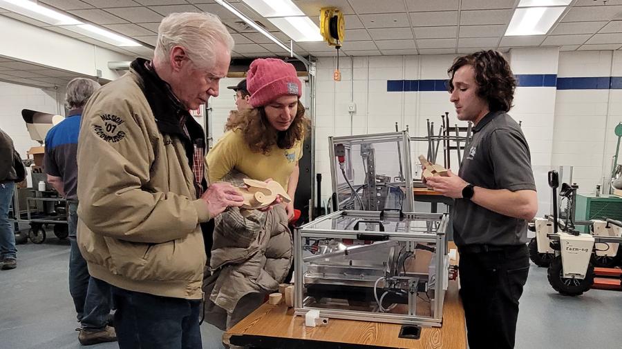 Deric McConnell demonstrating a machine
