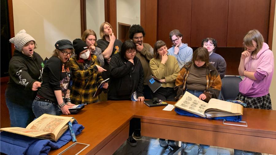 Students viewing larges books at the Newberry Library in Chicago.