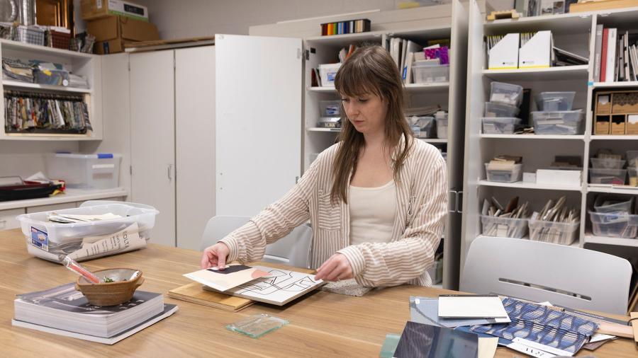 UW-Stout interior design major Khendra Thompson looks at samples in the interior design lab at UW-Stout's Applied Arts Building.