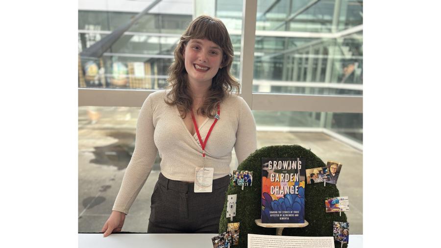UW-Stout student Sarah Vicciollo poses with her award-winning display.