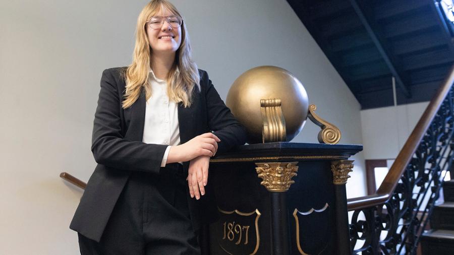Woman posed in stairwell