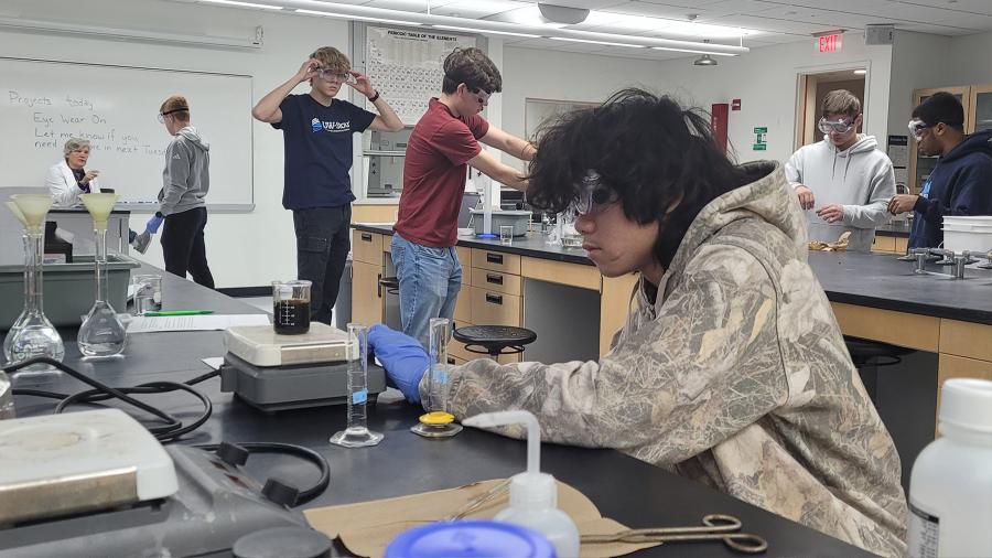 Honors chemistry student conducts experiments on an iodine clock