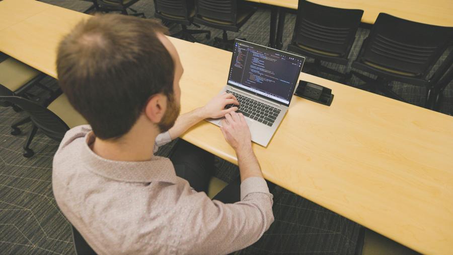 A student demonstrating a Retrieval Augmented Generation AI model