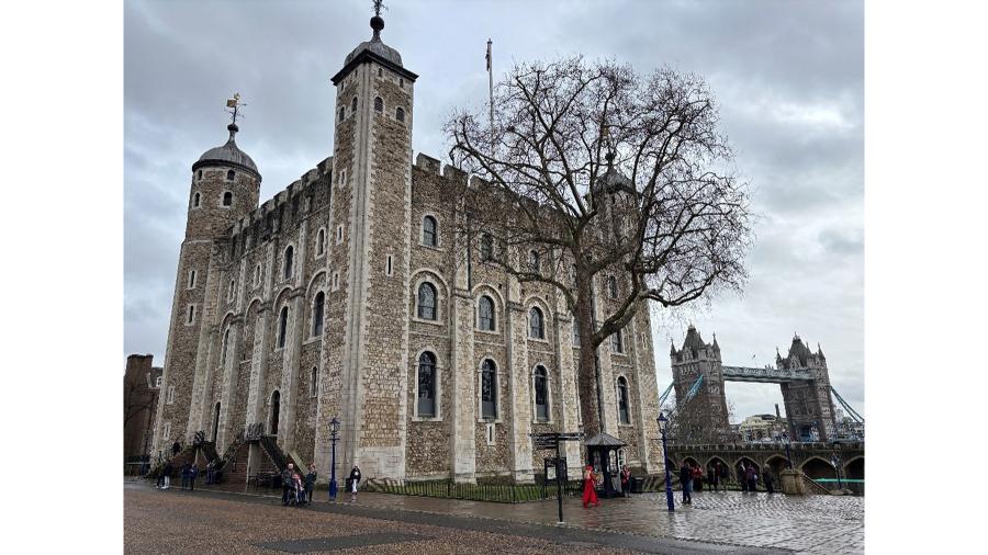 The White Tower at the Tower of London, with Tower Bridge in the background