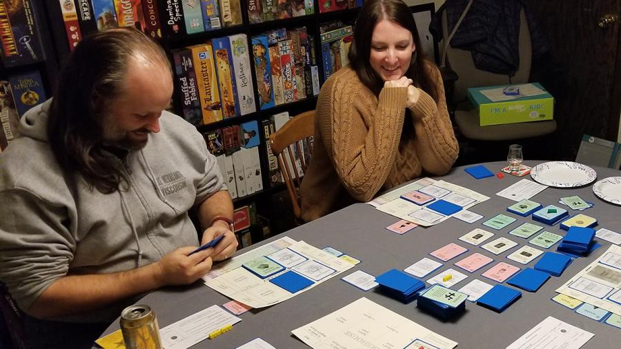 People playing a board game