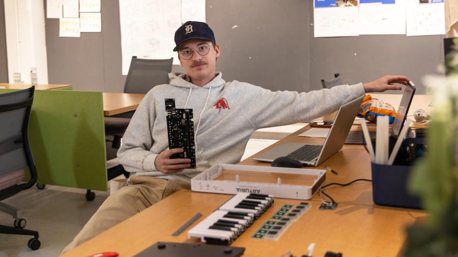 Jace Johnson shows the 3D-printed casing for his music making machine.