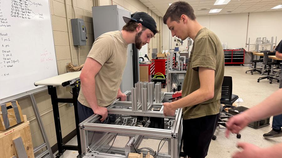 Manufacturing and mechanical engineering students work on their capstone project