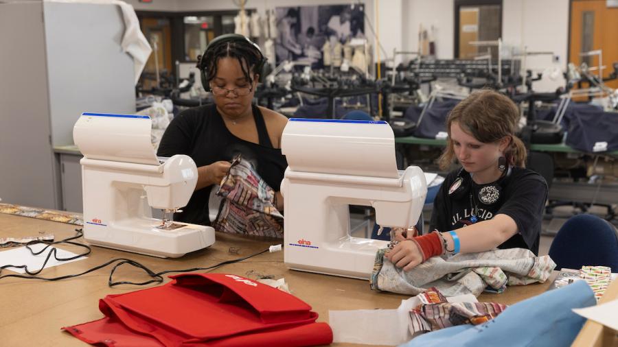 Students sew garments in the Fashion Design Lab.