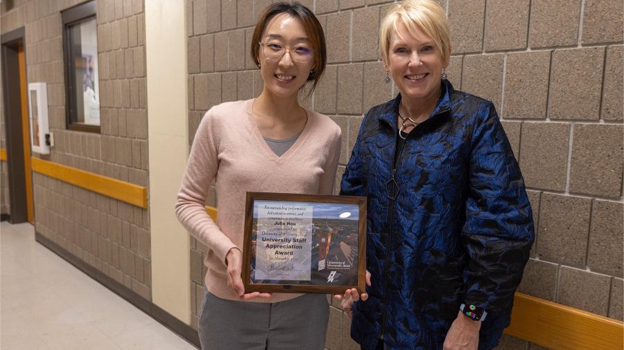Julia Hou and Chancellor Katherine Frank