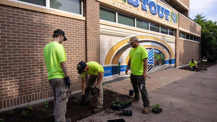 Workers in garden bed