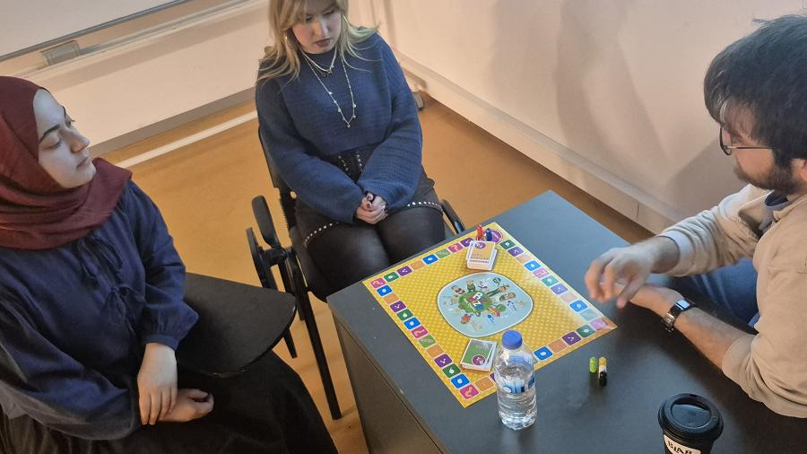 Three people in classroom