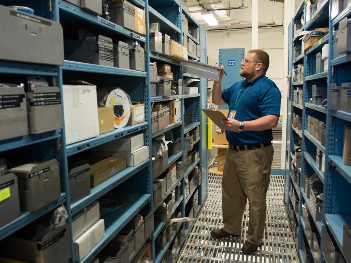 Adam Karis, a UW-Stout graduate student in the Operations and Supply Management program, works in the 3M Plant Engineering Stockroom.