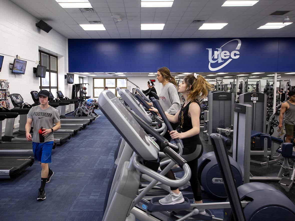 Students work out in the Sports and Recreation Complex fitness center. The Stout Student Association has approved a resolution recommending adding recreation space to the complex. / UW-Stout photos by Chris Cooper