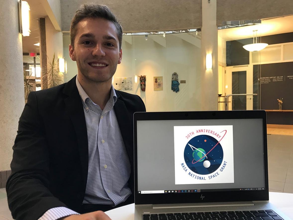 Kristofer Tremain won a national student contest with his NASA logo design.