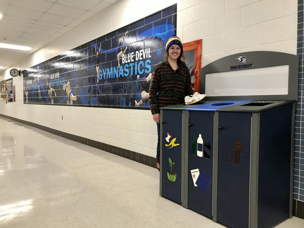 UW-Stout student Kelsea Goettl uses a compost bin at the Sports and Fitness Center on campus. RecycleMania, a nationwide collegiate competition, kicks off Sunday and continues through Saturday, March 28.