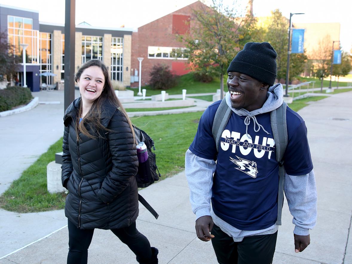 UW-Stout student Arthur Roques, at right, walks on the UW-Stout campus in a file photo. Roques is part of the National Student Exchange program and is spending a year studying at William Patterson University in Wayne N.J.