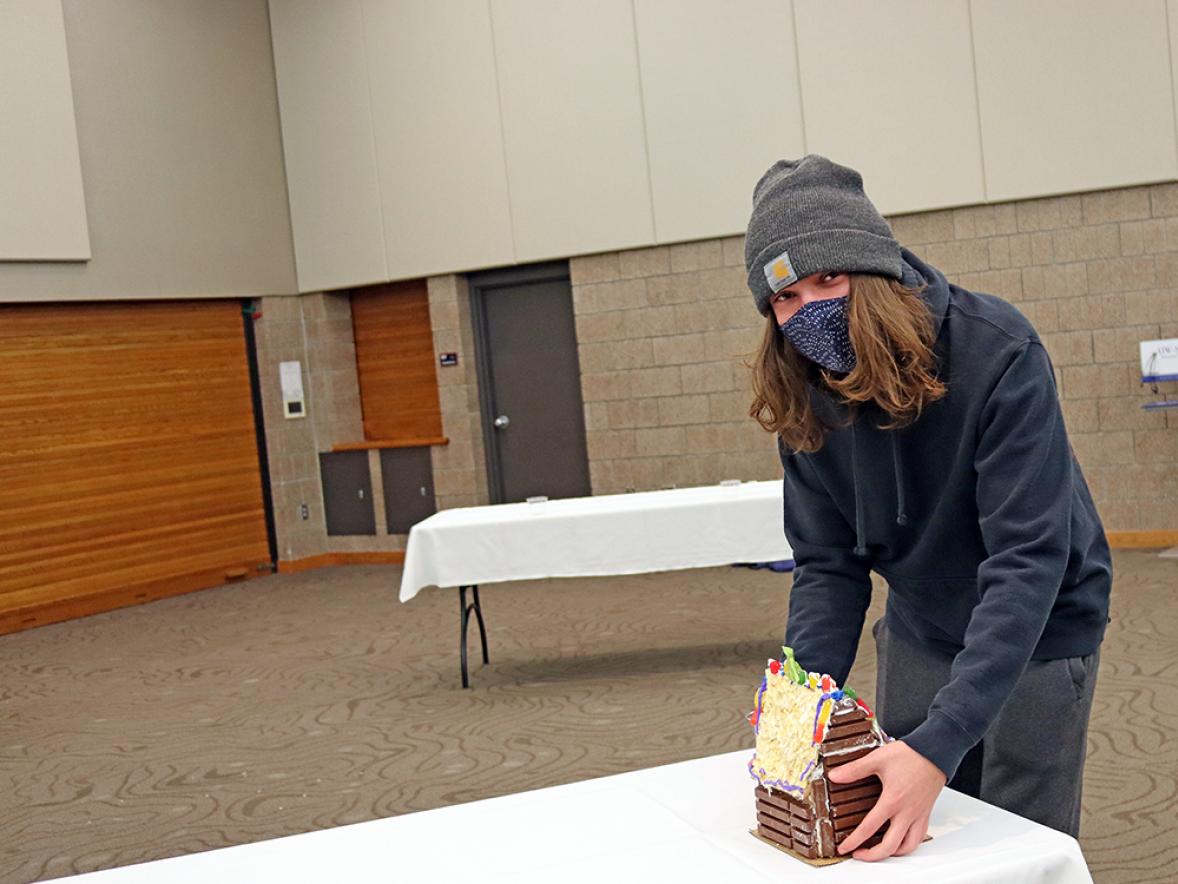 UW-Stout student Ross Barnett used Kit Kat candy bars on his gingerbread house to make it look like a log cabin.