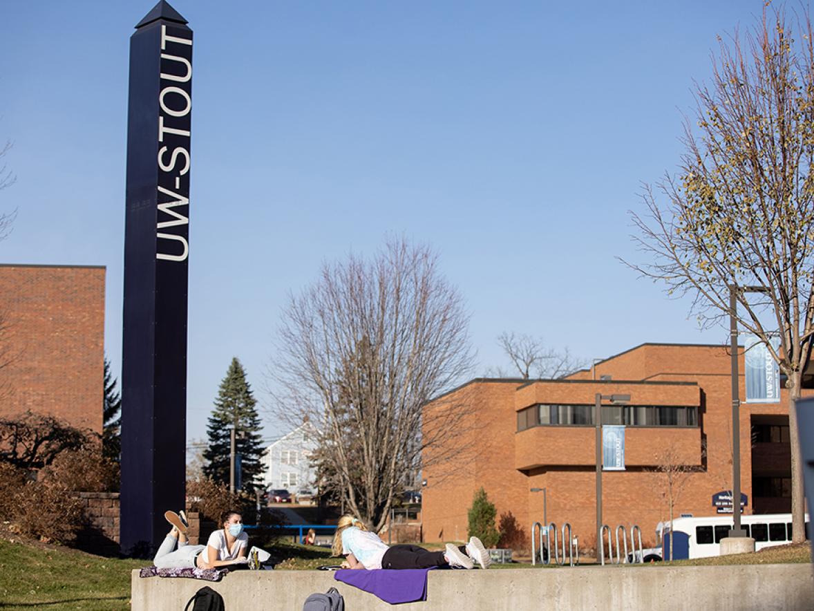 UW-Stout students draw outside the Memorial Student Center.