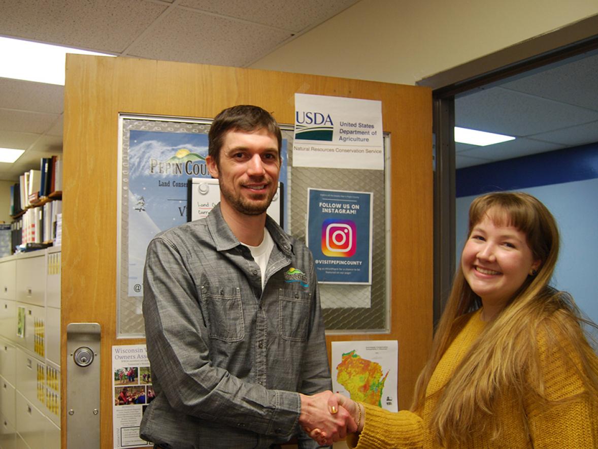 UW-Stout student Molli Reeder, at right, met last year prior to COVID-19 with Chase Cummings, Pepin County Land Conservation planning director.
