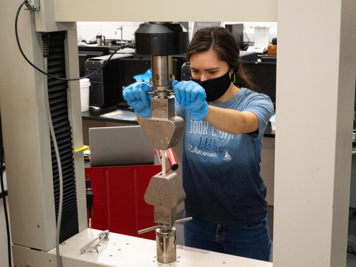 Plastics engineering major Olivia Hile works in a lab in 2020.