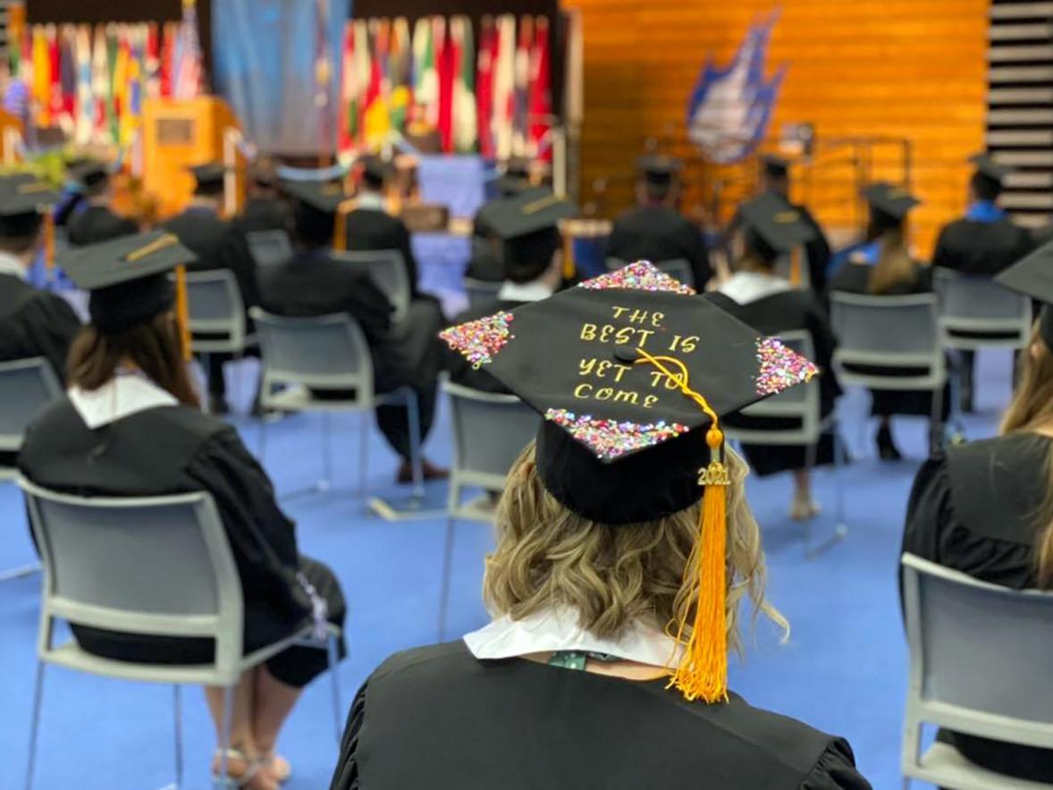 Students attend one of the four in-person commencement ceremonies Saturday, May 8.