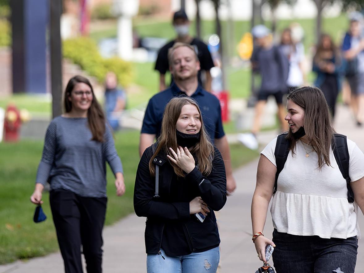 Students walk between classes with the fall semester underway at UW-Stout.