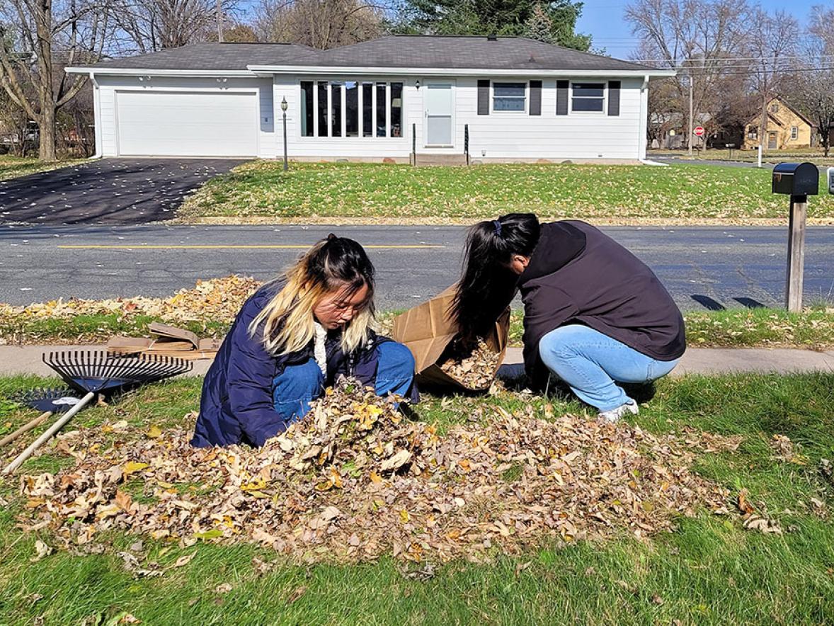Students helping with community fall clean up.